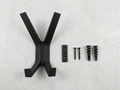 Black Garuda X shaped coat hanger with screws on a gray background.