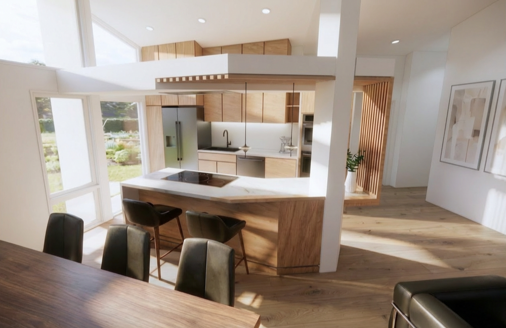 Interior view of the Niskayuna kitchen renovation showing a contemporary interpretation of Mid‑Century design. The space features light wood cabinetry, a marble island with integrated cooktop and dark bar stools, a stainless steel refrigerator, and a built‑in oven. The open dining area includes a dark wood table and chairs, while large windows bring in natural light and frame views of the landscaped garden. The materials and clean architectural lines create a warm, functional, and cohesive anchor for a home